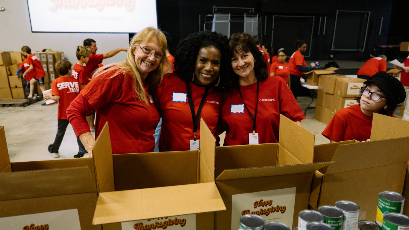 Volunteers packing Thanksgiving boxes